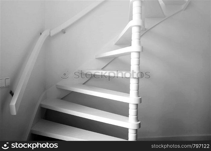 Heavy shadow of stairway Black and White, wooden stairs modern design close-up. Heavy shadow of stairway Black and White, wooden stairs modern design