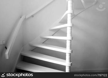 Heavy shadow of stairway Black and White, wooden stairs modern design close-up. Heavy shadow of stairway Black and White, wooden stairs modern design