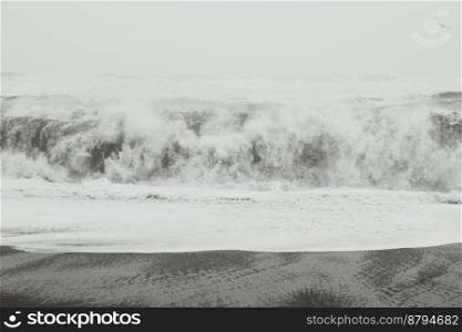 Heavy storm in ocean monochrome landscape photo. Beautiful nature scenery photography with sky on background. Idyllic scene. High quality picture for wallpaper, travel blog, magazine, article. Heavy storm in ocean monochrome landscape photo