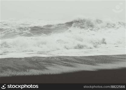 Heavy storm on sea beach monochrome landscape photo. Beautiful nature scenery photography with sky on background. Idyllic scene. High quality picture for wallpaper, travel blog, magazine, article. Heavy storm on sea beach monochrome landscape photo
