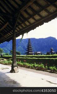Hedge in front of a temple, Pura Ulu Danau Temple, Bali, Indonesia