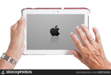 Heerenveen, the Netherlands - July 6, 2015: Black Apple logo is displayed on a white iPad on July 6, 2015 in Heerenveen