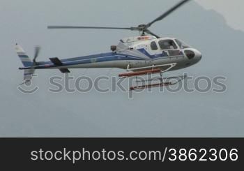 Helicopter hovering over water
