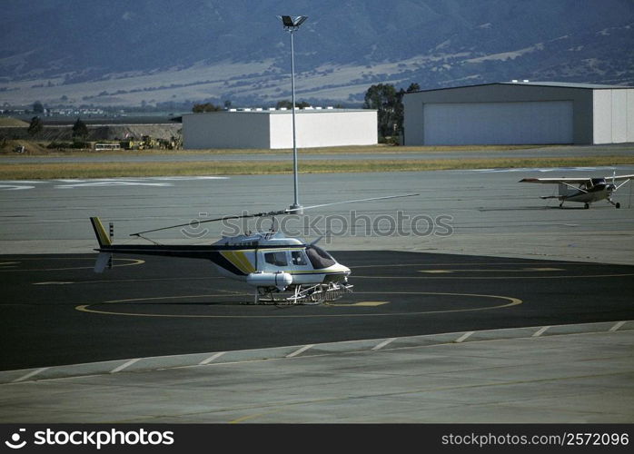 Helicopter rigged for aerial irrigation