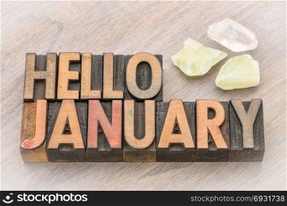 Hello January in vintage letterpress wood type with quartz calcite crystals