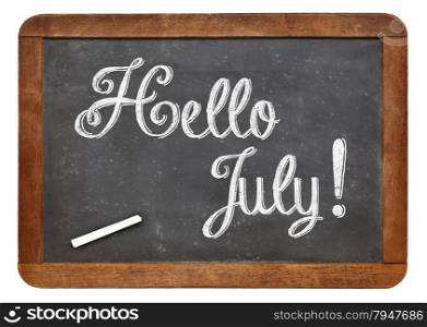 Hello July sign - white chalk text on an isolated vintage slate blackboard