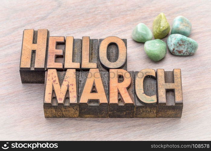 Hello March in vintage letterpress wood type with green gemstone crystals