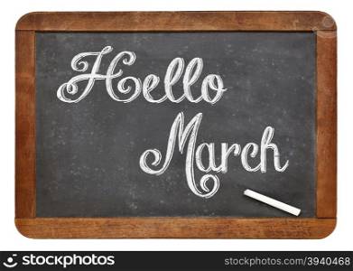 Hello March sign - white chalk text on an isolated vintage slate blackboard