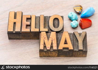 Hello May in vintage letterpress wood type with colorful gemstone crystals