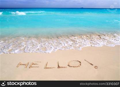 Hello message spell written in tropical beach sand Caribbean turquoise sea