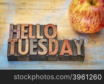 Hello Tuesday - text in vintage letterpress wood type with an apple