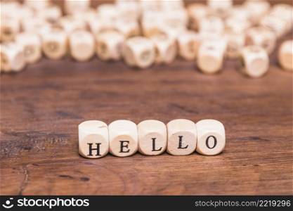 hello word made with dices wooden desk