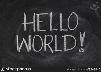 Hello, World! message from a first computer program used in many introductory tutorials for teaching programming language, white chalk handwriting on blackboard