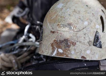 helmet with rope and tools for industry alpinism job