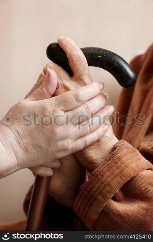 Help concept with hands of women, focus point selective ,soft studio light