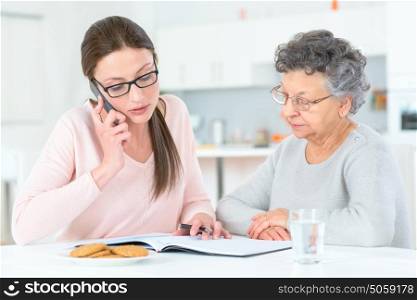 Helping senior lady with her finances