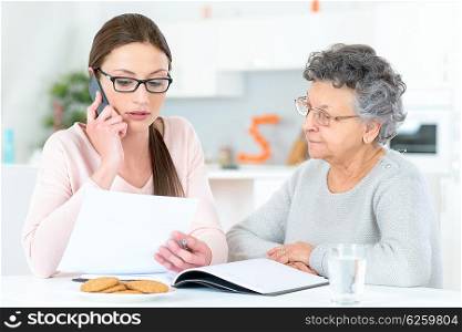 Helping senior lady with her finances