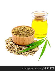 Hemp flour in a bowl, beans and green leaf of hemp, hemp seed oil in a glass jar isolated on white background