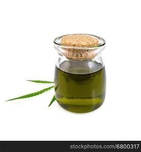 Hemp oil in a glass jar with a leaf isolated on white background