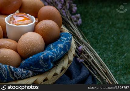 Hen / Close-up of Fresh chicken eggs on basket. Nutrition concept, Copy space, Selective focus.