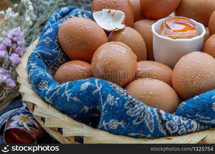 Hen / Close-up of Fresh chicken eggs on basket. Nutrition concept, Selective focus.