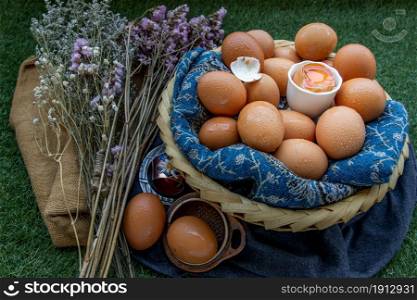 Hen / Fresh chicken eggs on basket. Nutrition concept, Selective focus.
