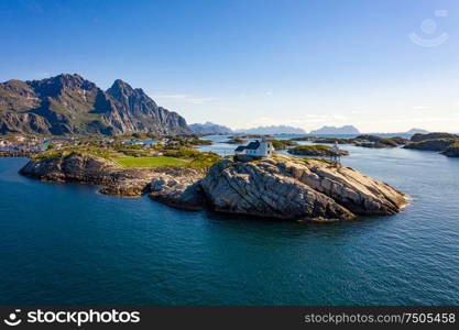 Henningsvaer Lofoten is an archipelago in the county of Nordland, Norway. Is known for a distinctive scenery with dramatic mountains and peaks, open sea and sheltered bays, beaches and untouched lands