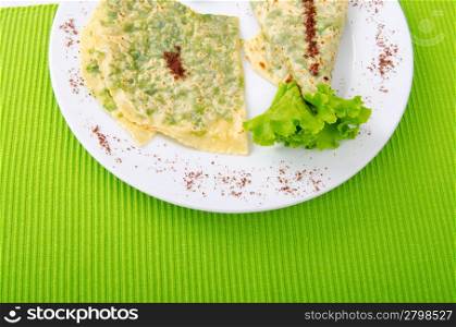 Herb stuffed pancaces in the plate