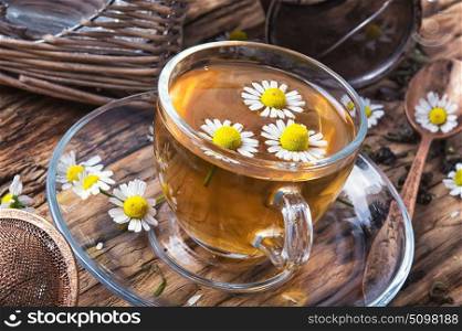 herb tea with chamomile flowers