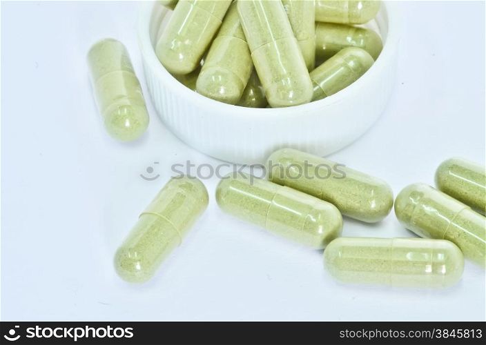 Herbal medicine capsules close up