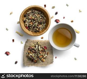 Herbal tea and Cup on white background. The view from the top.. Herbal tea and Cup on white background. The view from the top