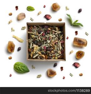 Herbal tea, mint and caramel sugar on a white background. The view from the top.. Herbal tea, mint and caramel sugar on a white background. The view from the top