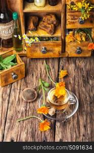 Herbal tea with calendula flowers. Herbal tea with decoction of marigold flowers