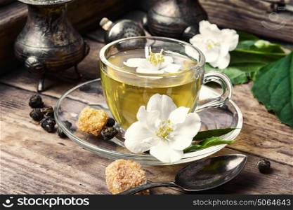 herbal tea with Jasmine flowers. popular Chinese green tea with white Jasmine flowers