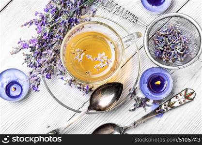 Herbal Tea with lavender. Fragrant herbal tea with flowering lavender sprigs