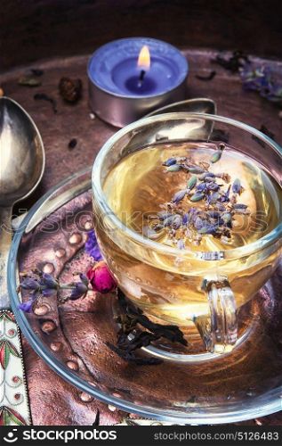Herbal Tea with lavender. Fragrant herbal tea with flowering lavender sprigs