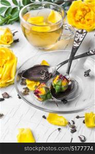 Herbal tea with yellow rose. flower herbal tea with petals yellow tea rose