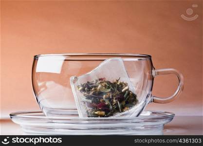 Herbal teabag in a cup