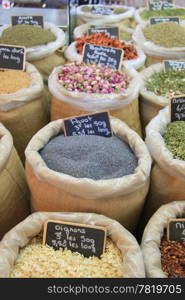 Herbes and spices in jute bags on a Provencal market in France