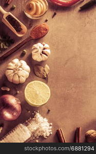 herbs and spices at stone table background