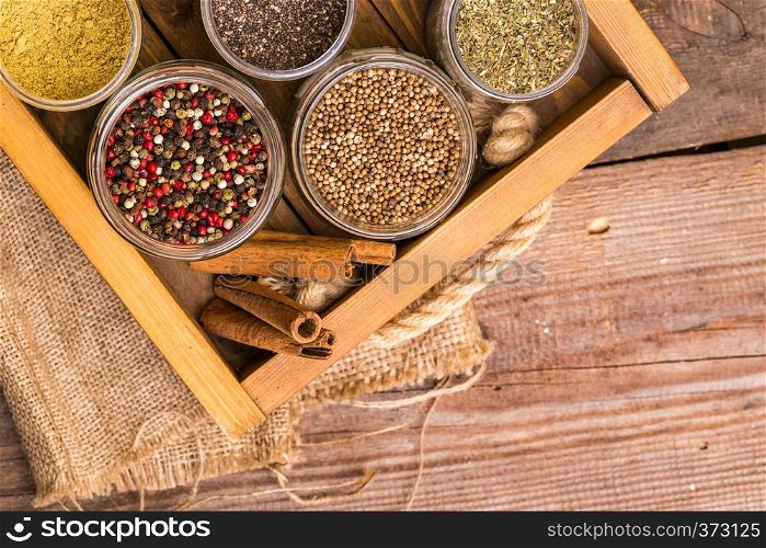 herbs and spices. cinnamon, pepper mix, flax seeds, chia and coriander at the spice drawer.