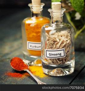 Herbs and spices selection on rustic background