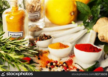 Herbs and spices selection on rustic background