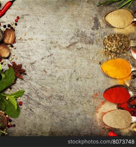 Herbs and spices selection on rustic background - cooking, gardening or vegetarian concept