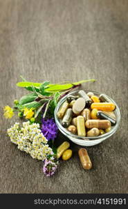 Herbs with alternative medicine herbal supplements and pills