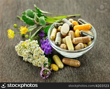 Herbs with alternative medicine herbal supplements and pills