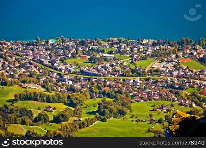Hergiswil village and Lake Luzern aerial view from mount Pilatus, landscape of Switzerland