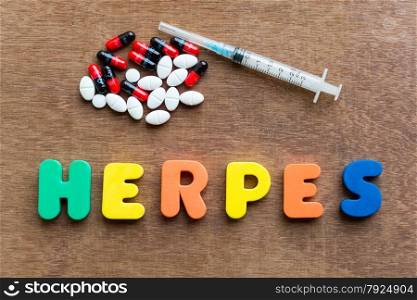 herpes colorful word in the wooden background