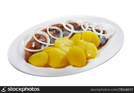 herring fish fillets with potato and onion.isolated