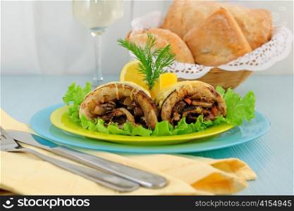 Herring stuffed with mushrooms and cheese with chabatoy